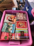Pink bin of dvds popular titles