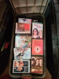 Black bin of DVDs