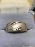 Antique sterling silver ring with one small diamond