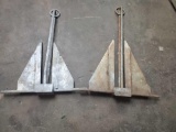 2 smaller sized boat anchors