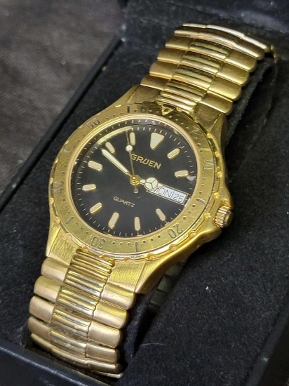 Mens Gold Gruen Wristwatch with Calendar