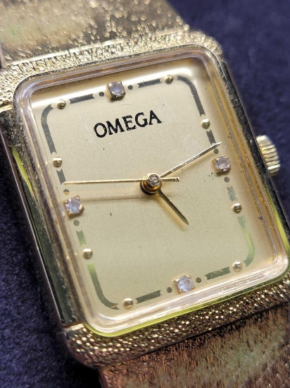 Omega 14k gold watch