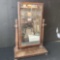 Vintage dark wood piece with tilt mirror