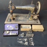Vintage Franklin sewing machine with attachments