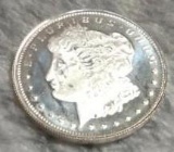 1/10th an oz Silver Morgan Dollar. Proof. Great coin for beginners.