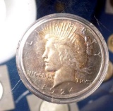 Peace silver dollar 1924 rainbow toned unc nice color