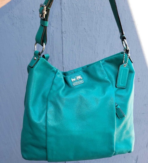 Jade Hobo Leather Cowhide bag says Coach