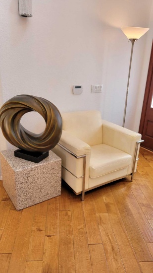 Leather Upholstered Chair and Artwork (click photo to see more)