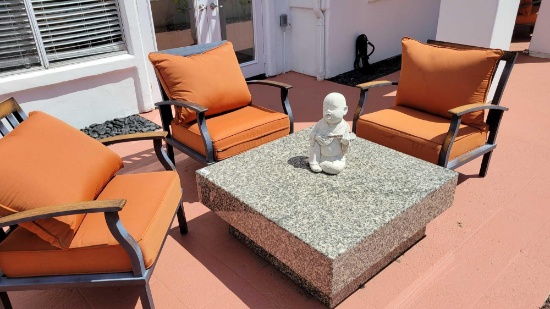 granite table with 3 Sunbrella chairs (terracotta color)