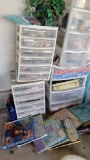 Scrapbooks and lots of plastic storage bins of crafting supplies