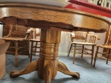 Oak Dining Room table with expandible leaf 4 chairs