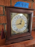 Howard Miller Mantle Clock has battery hidden compartment