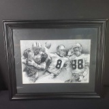 Framed artwork featuring E.Smith T.Aikman M.Irving