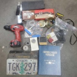 Misc. lot 2 gun cleaning kits. Skill 12V drill no charger old license plates etc.