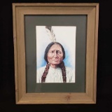 Framed artwork of Tatonka Yotanka Hunkpapa from Souix tribe.