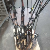 Approx. 15 fishing rods 4 w/reels Stand included