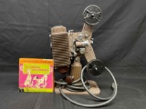 Vintage 1940s Revere Camera Company Model 85 8mm Projector w/ Disney Dalmation Super 8 Reel