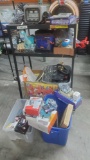 Entire cart lot misc. toys. kitchenware. sports cam. books. headphones. clocks etc.