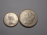 Morgan silver dollar and canada half dollar 1884 and 1961