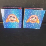 2 binders of disney trading pins and holiday pins