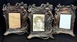 Fancy Heavy Metal picture Frames with an old photo.