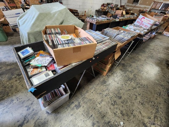 entire row tables cds various titles estimated 1 pickup truck load 1000s