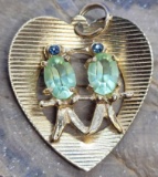 14kt Gold Heart Shaped pendant With Set gemstone