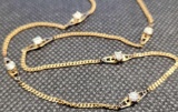 14kt gold necklace with 8 set diamonds