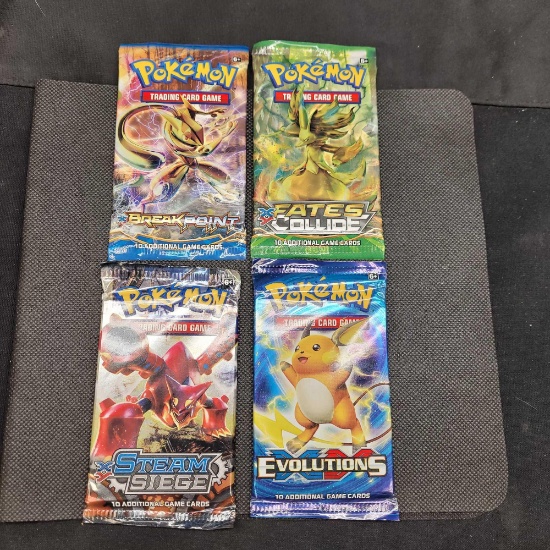4 Packs of pokemon Cards