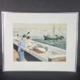 Framed artwork man cleaning fish on dock W/signature 1991