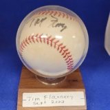 Signed baseball saying Tim Flannery