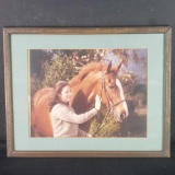 Framed photograph woman with horse.