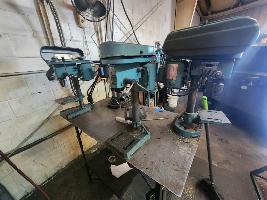 Steel Workshop Table with x4 Mounted Benchtop Drill Presses powers on