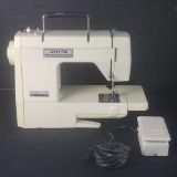 White Precision Built Zigzag sewing machine W/foot petal model 999