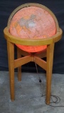 Vintage lighted world globe on stand Illuminate