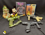 Mixed Goods. Micky Mouse Bank, Shaquille ONeil Bobble head, Paintball guns more