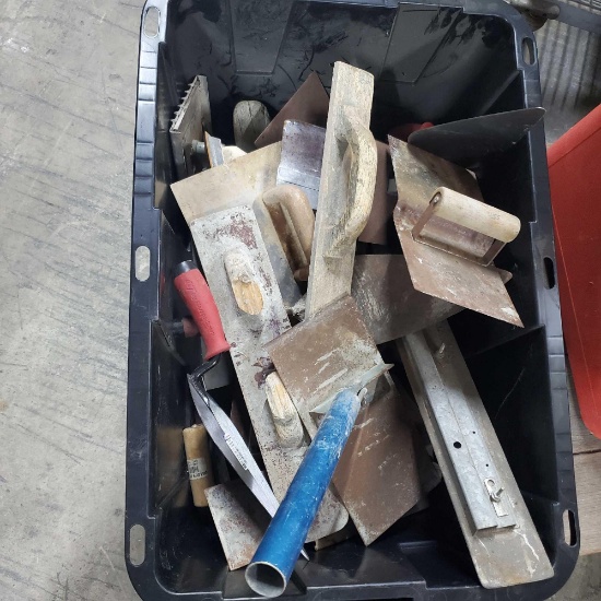 Bin of concrete tools trials floaters edgers etc.
