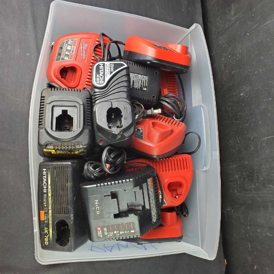 Bin of cordless battery chargers Milwaukee Makita DeWalt Porter Cable Craftsman