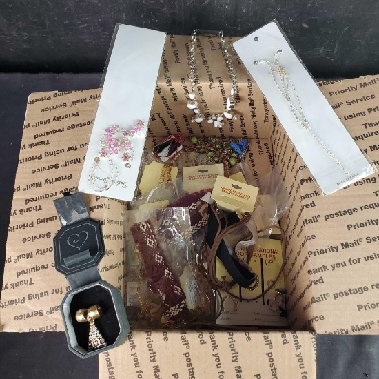 Box of misc. costume jewelry necklaces earrings etc.