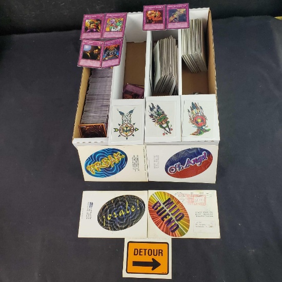 Box of 1996 Yu-Gi-Oh cards and temporary/Removable tattoos bumper stickers