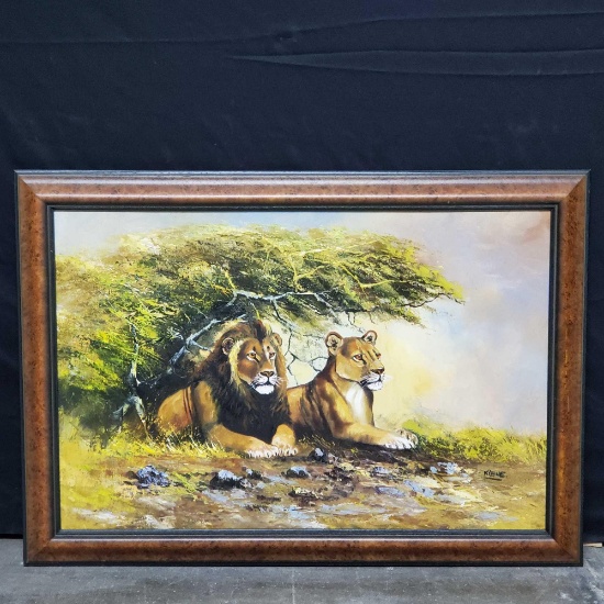Framed oil/canvas artwork lion/lioness under bush signed Kibue