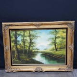 Large framed oil/canvas artwork landscape trees/water signed L. Noger