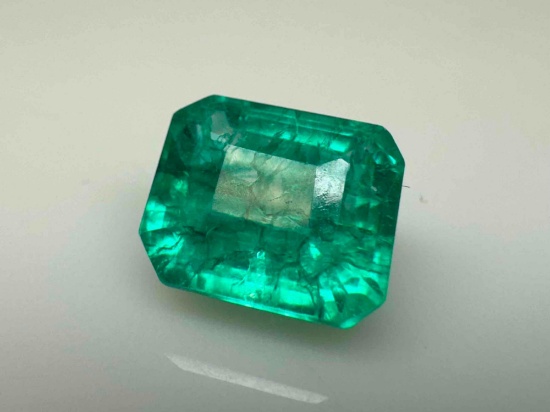 Vivid 8.4ct Emerald cut Emerald Gemstone Mega Glow