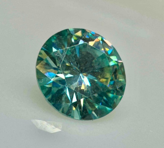 1.1ct Brilliant Round Cut Blue Moissanite diamond gemstone, a true beauty