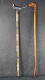 2 unique walking sticks/canes wooden carved bird head decorative black/white bird