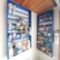 2 wall shelfs various paint primer solvents etc.