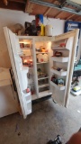 Kenmore Coldspot model 106 vertical fridge/freezer contents not included