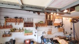 wall lot various hand tools chisels screwdrivers Central Machinery 6in. bench grinder finish nailers