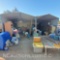 2 metal tube framed carports/awnings with corrugated metal pannel sides and roof approx.113in tall