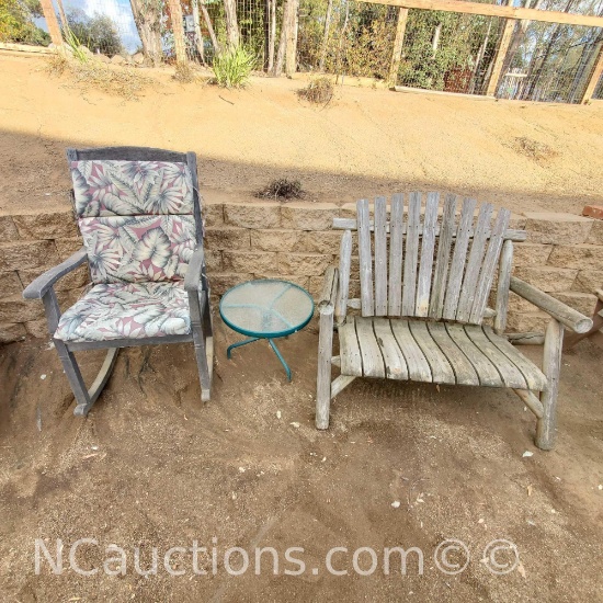 Wooden outdoor rockingchair and bench with round metal glass top table